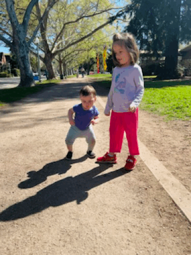 Two kids walking.
